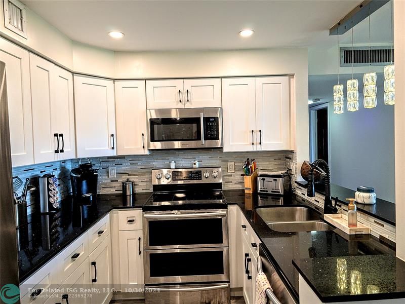 Tons of storage in this wet bar area.