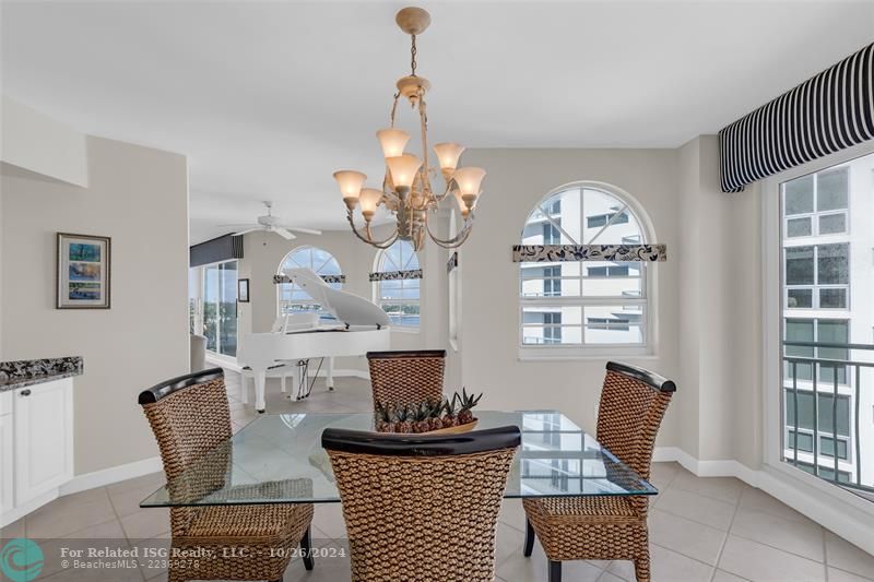 Dining area with views of Intracoastal and direct access to covered balcony.