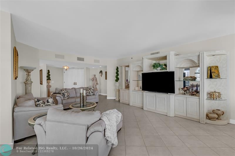 Spacious living room with views of the Intracoastal, sunsets, and downtown Fort Lauderdale.