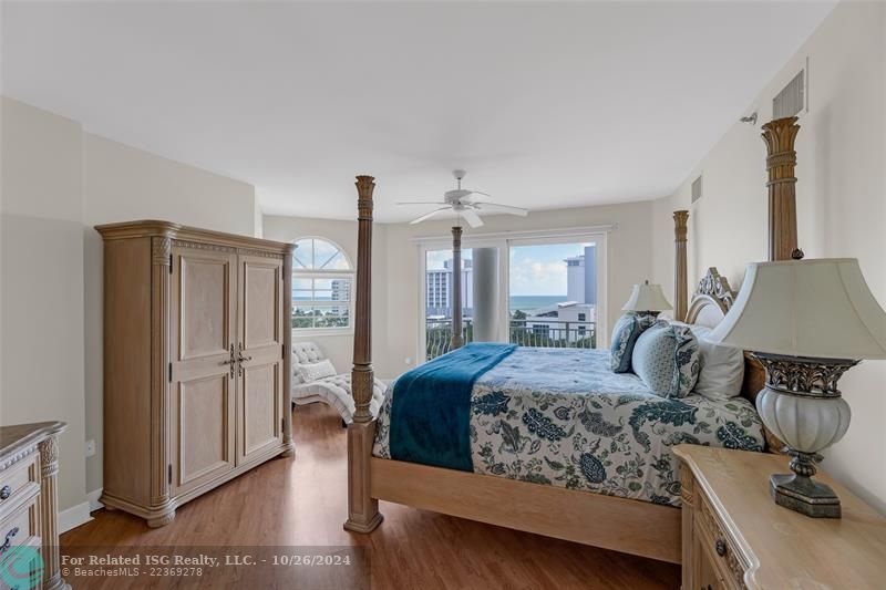 Primary bedroom suite has direct ocean views from a covered balcony.