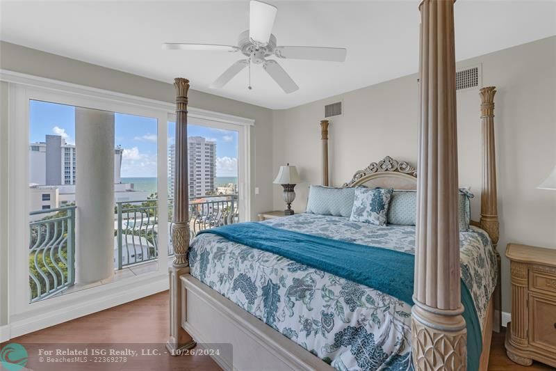 Primary bedroom suite has direct ocean views from a covered balcony.