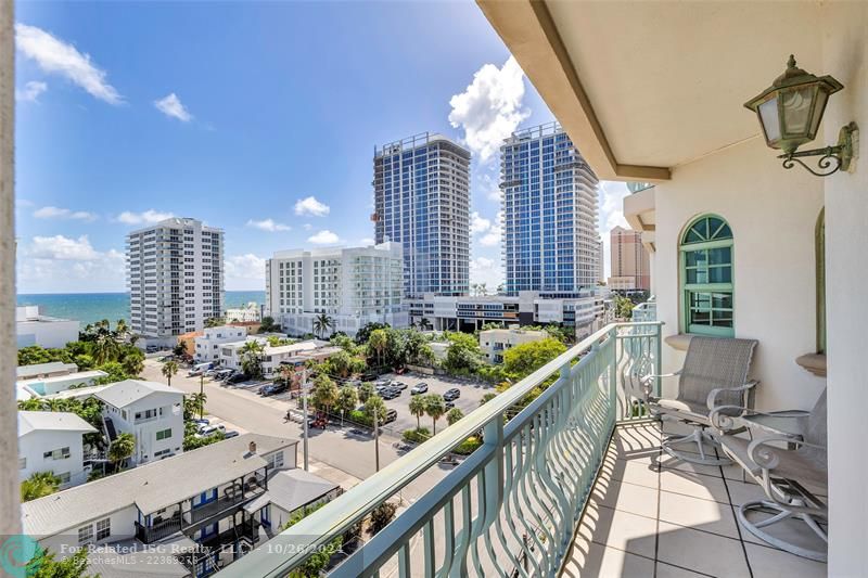 Primary bedroom suite has direct ocean views from a covered balcony.