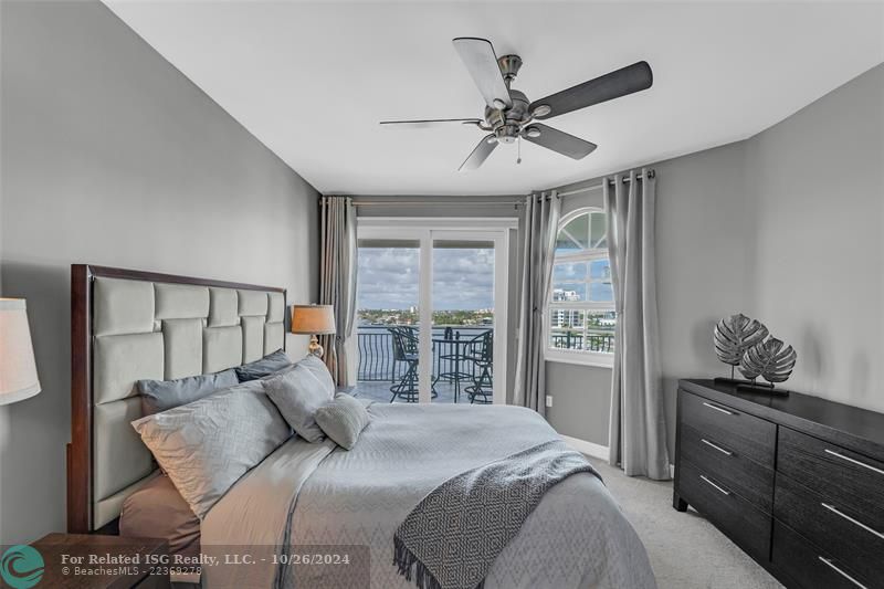 3rd bedroom with en-suite bath, direct Intracoastal views and access to large covered balcony.