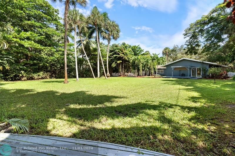 massive yard, fresh mulch and updated lush landscaping.