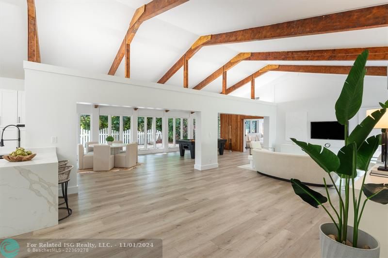 Open floor plan, wood beams natural grain stained add an architectural charm & warmth sleek style.