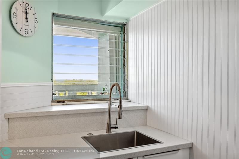 Look at the ocean while you wash dishes.