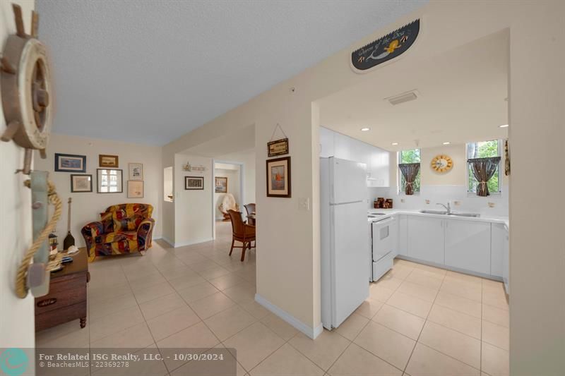 Beautiful neutral tile floors throughout.