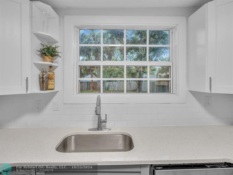 UPDATED KITCHEN WITH STAINLESS STEEL APPLIANCES