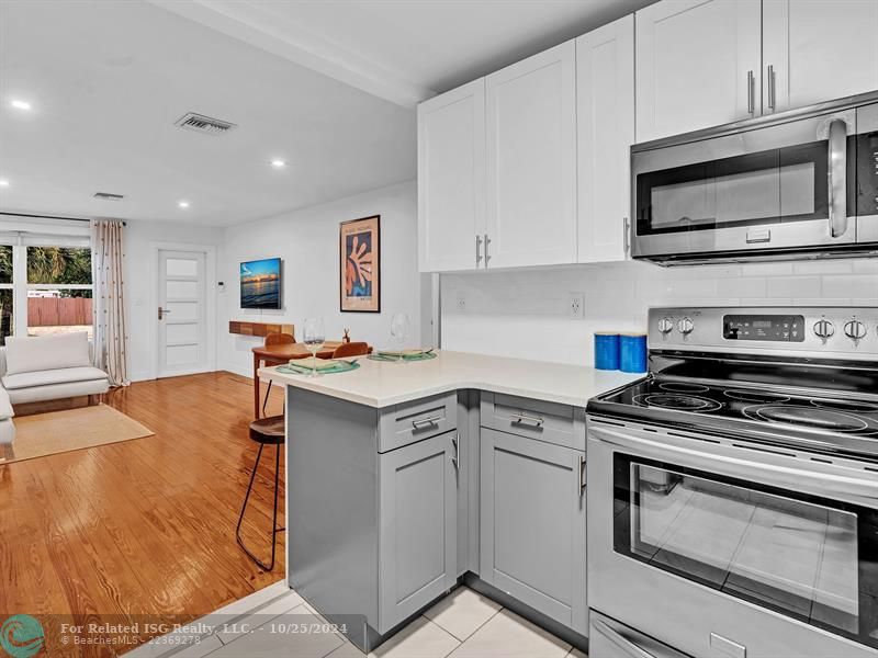 UPDATED KITCHEN WITH STAINLESS STEEL APPLIANCES