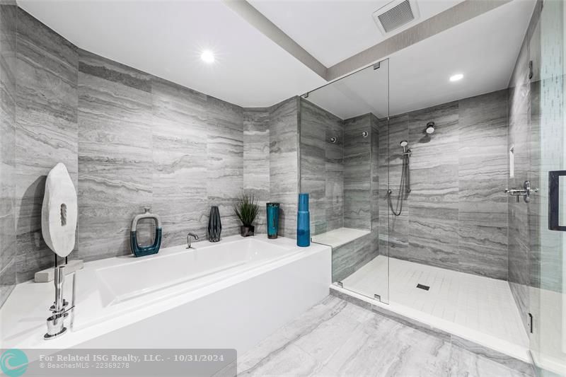 Luxurious soaking tub + massive walk-in shower