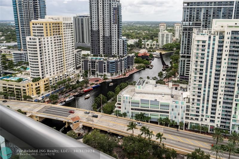 Beautiful vistas off the balcony of the river, city, park & ocean coastline from the great room & kitchen. The sunsets are unbeatable from this condo!