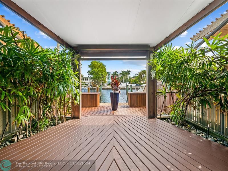 Fabulous waterfront covered patio off the living room.