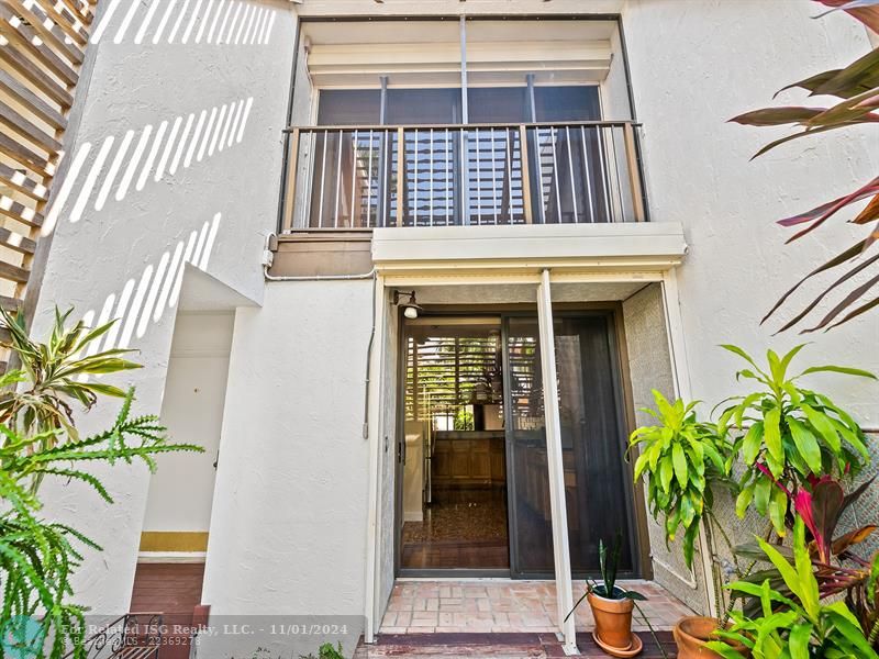 Upstairs balcony sits off the 2nd bedroom - Courtyard sits off the kitchen