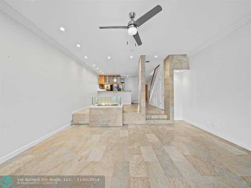 Looking back from the living room towards the dining area and kitchen