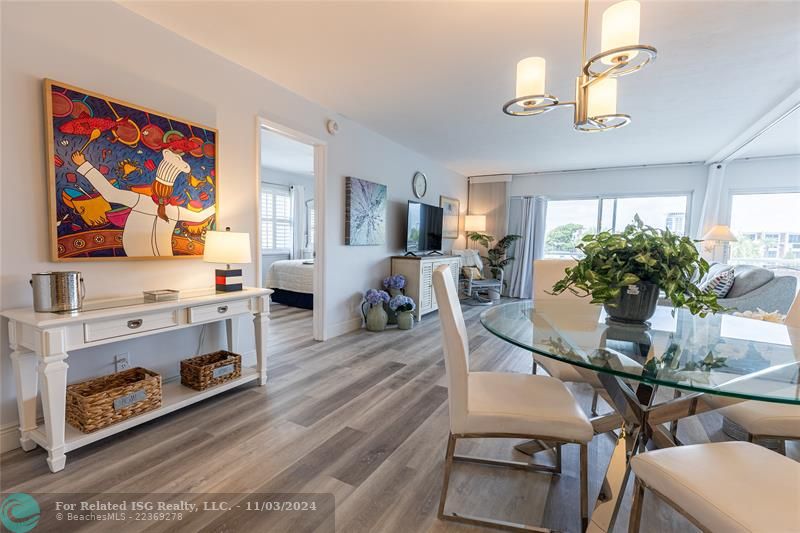 Living Room can be sectioned off for privacy with a convenient hidden pull-down Murphy bed.