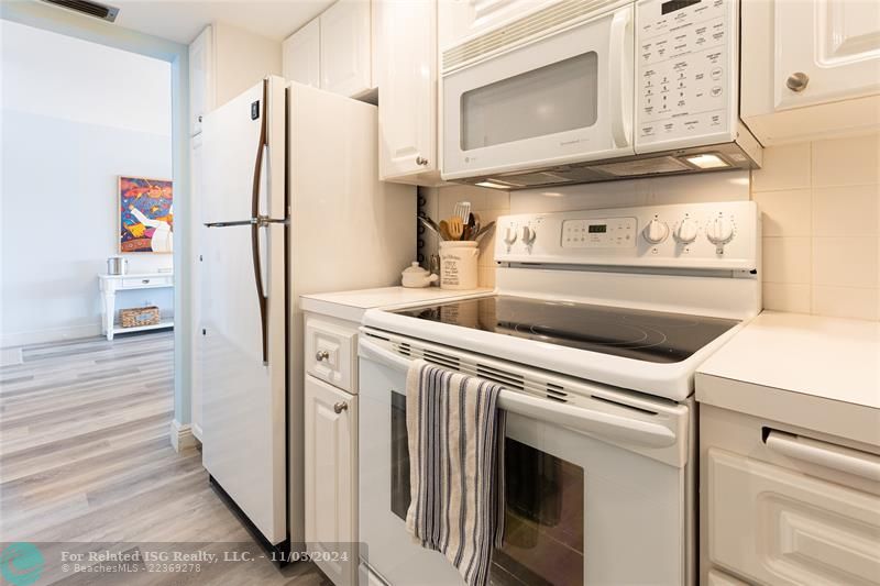 Living Room can be sectioned off for privacy with a convenient hidden pull-down Murphy bed.