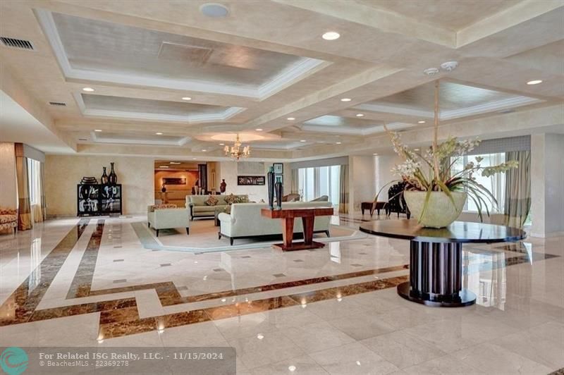 Southpoint's lobby has floor to ceiling windows that face out onto the upper pool deck and the ocean.