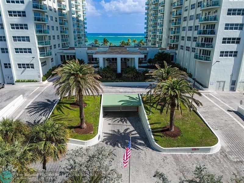 Southpoint: two 22 story luxury highrise towers (South tower on the right, North tower on the left), connected by the beautiful lobby. All apartments have washer and dryers in the units, under building/garage assigned parking, and a healthy fully funded reserve fund. Our tennis court is to the left of the north tower and our pool and pool deck is between the two towers.