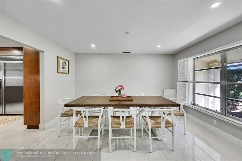 Dining Room off the kitchen and may entry way.