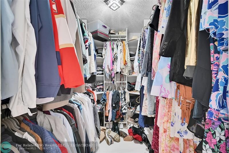 Master closet with built ins.