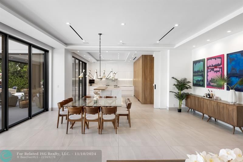 A Concealed Door Sperates the Kitchen & Dining Room When Entertaining