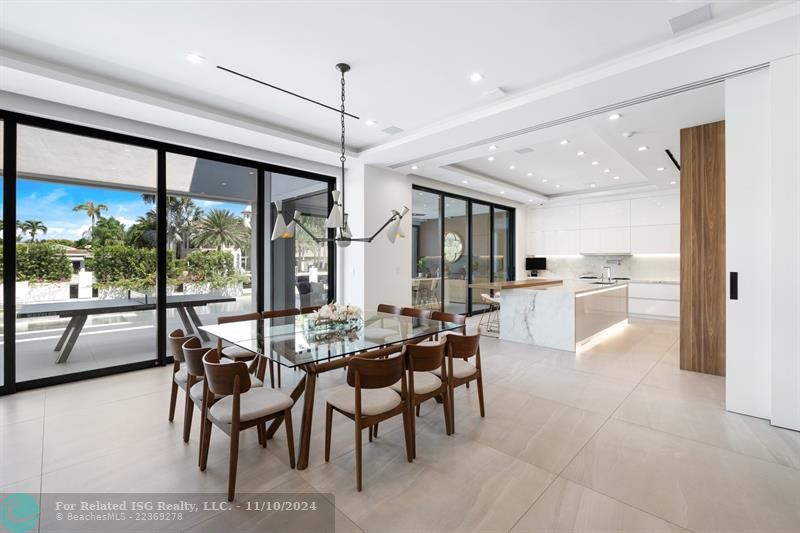 Notice This Expansive Sliding Door Closes The Kitchen Area As Desired