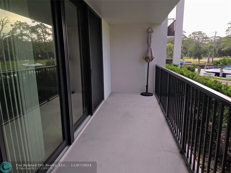 Huge Balcony with floor to ceiling impact sliding doors and windows.