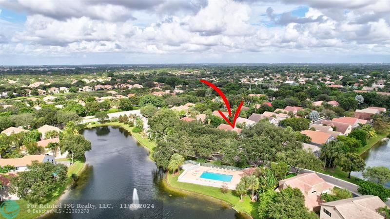 Aerial view of home and it's proximity to community pool