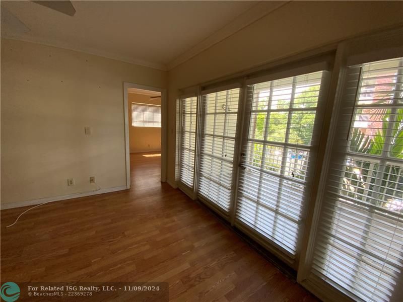 Living room and balcony. Doorway going into bedroom #2