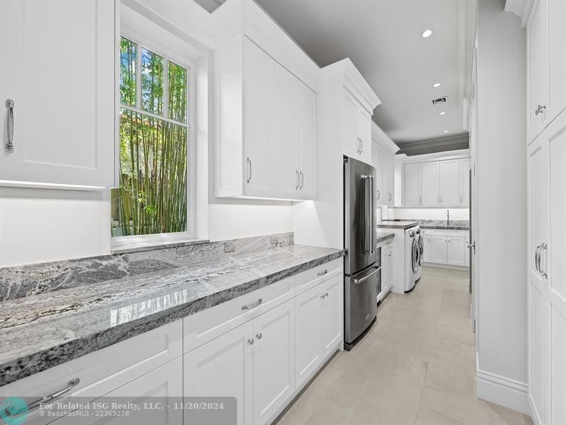 Laundry and pantry with exceptional storage