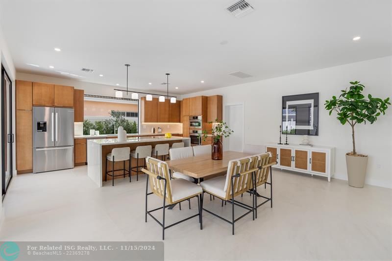 Large picture window at sink making kitchen open and airy