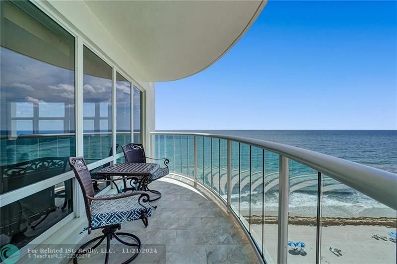 The balcony has gorgeous views facing directly east and southeast, all the way down the coast, as well as a view of the under renovation pool deck.