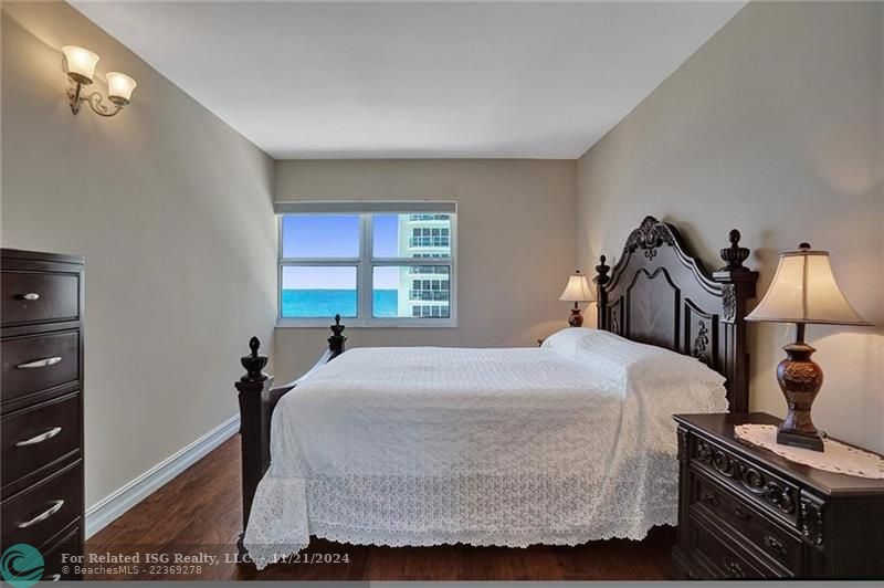 The second/guest bedroom, where the bed has been perfectly situated to take advantage of the ocean views.