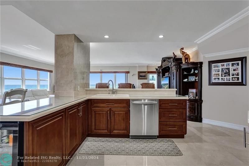 The kitchen has marble countertops.