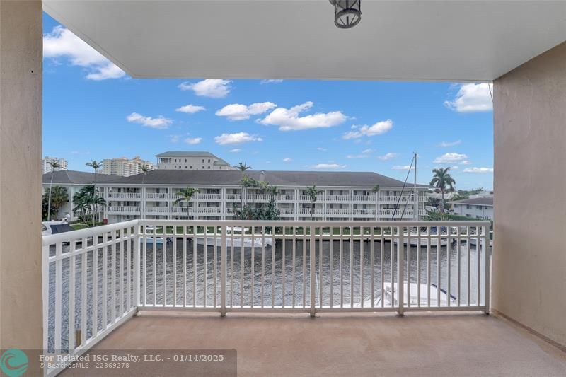 Covered Balcony with Great View of Canal