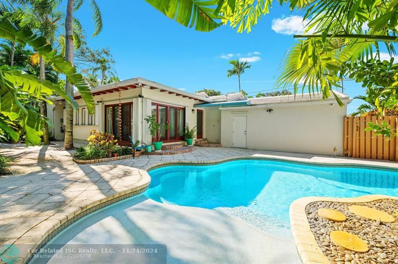 Tropical Landscaping and Numerous Patios to Relax Outside