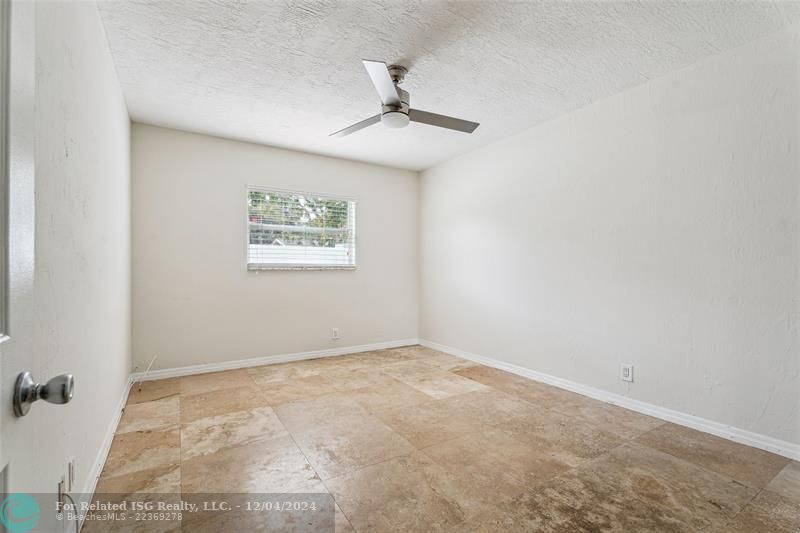 Second bedroom all marble floors/window