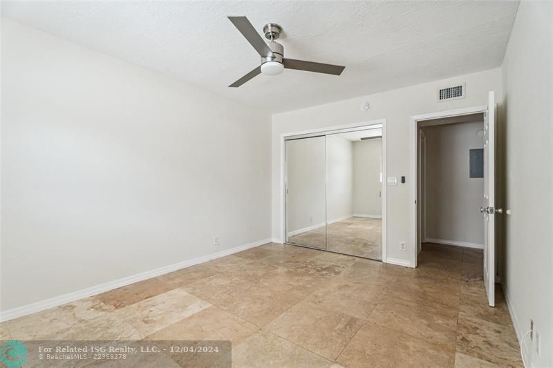 This Bedroom all marble floors leads to patio