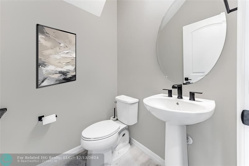 Downstairs guest bathroom/powder room.