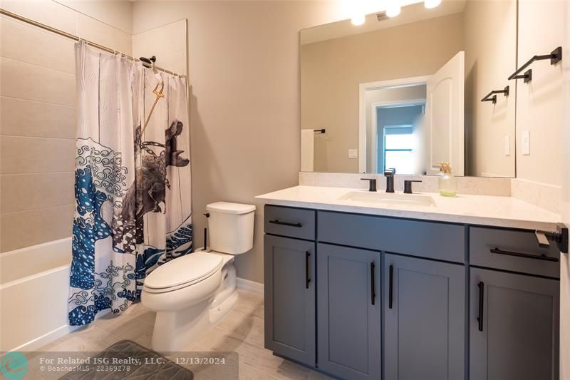 bathroom #2, shower with bath tub, quartz countertops