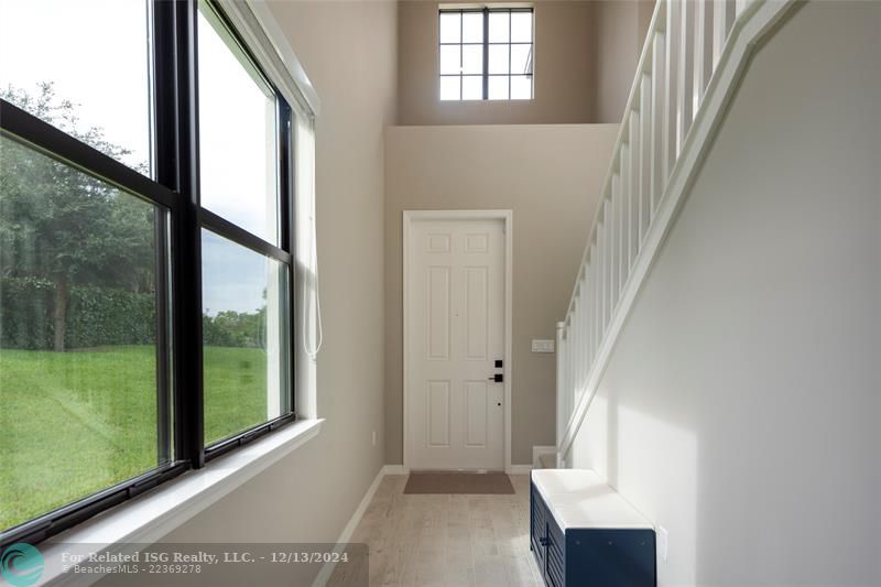 Foyer entry with double ceilings