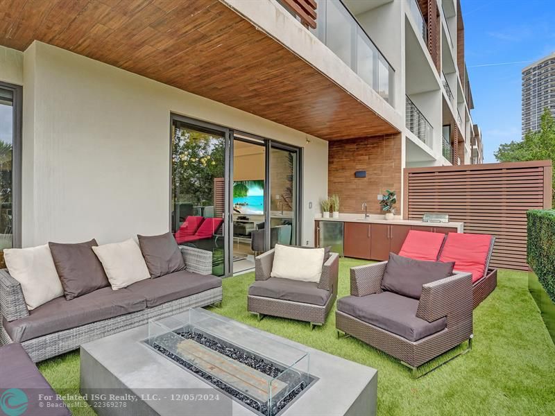 Enormous private balcony with summer kitchen.