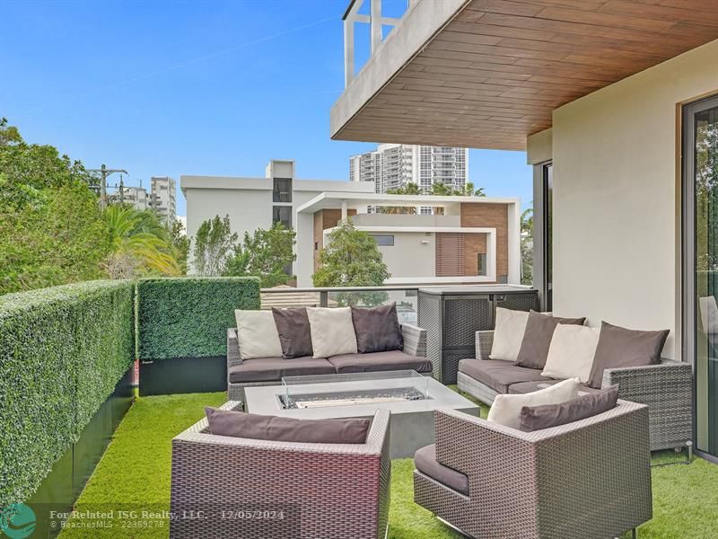 Enormous private balcony with summer kitchen.