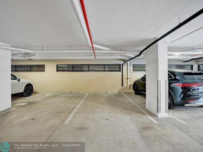 2 covered parking spaces in garage