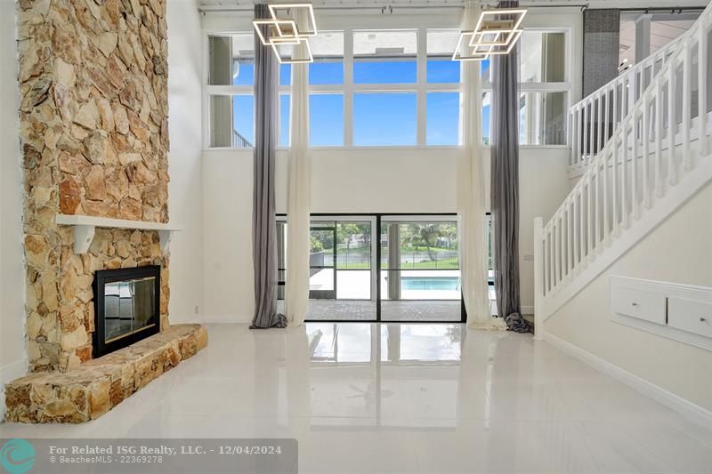 Living room area, with vaulted ceiling.