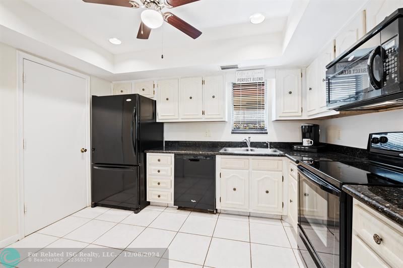 Kitchen with door to garage