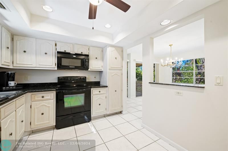 Kitchen opens to dining room