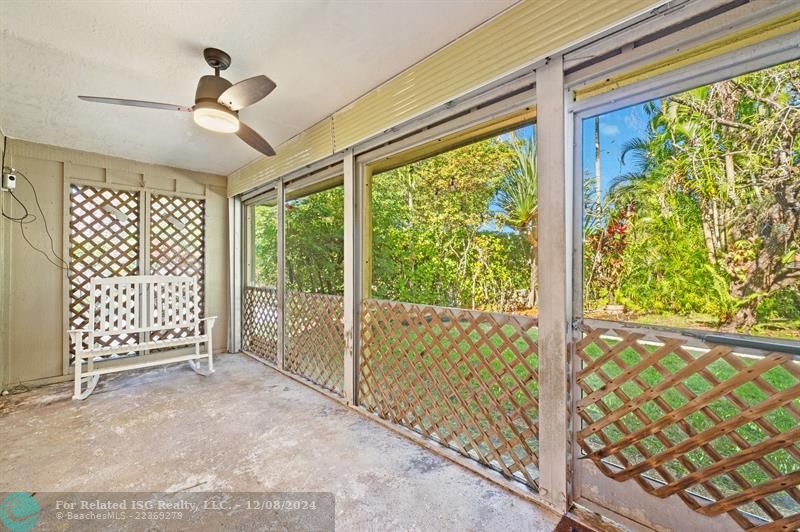 Screened and covered back patio