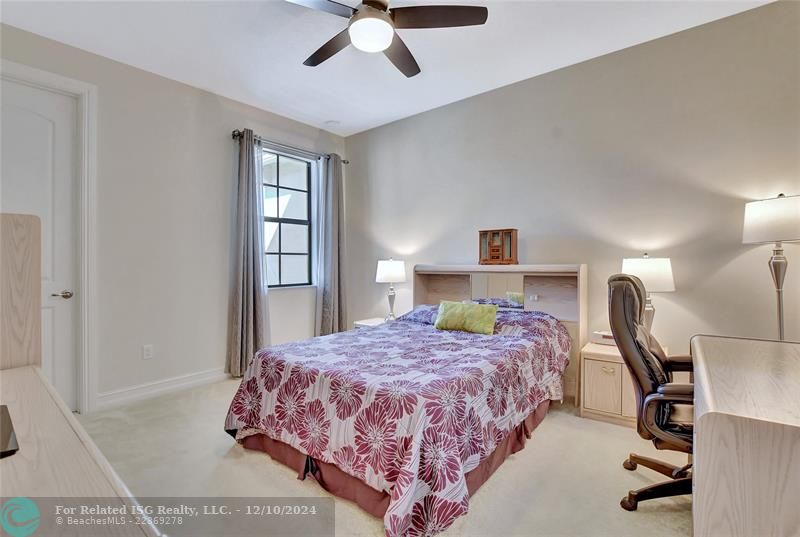 Large guest bedroom boasts an oversized closet.