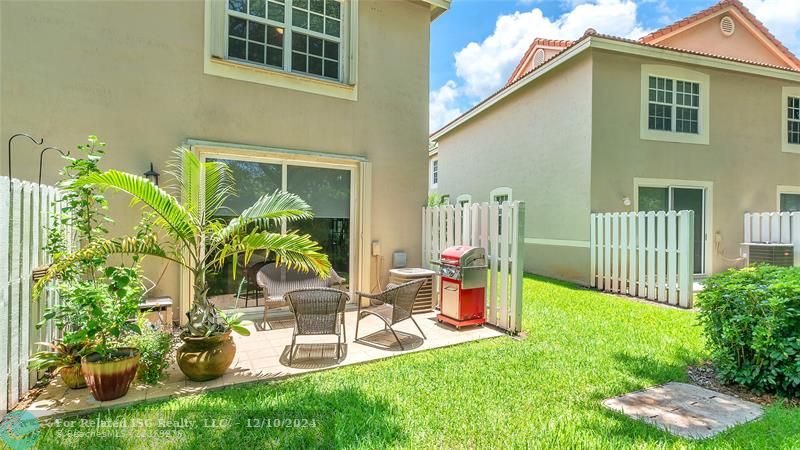 Relaxing outdoor oasis with open patio perfect for summer BBQs